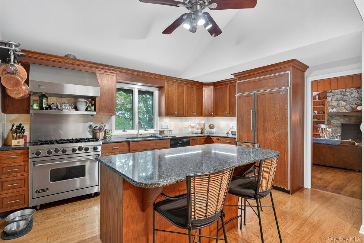 Fireplace, Interior, Kitchen, Stainless Steel Appliances, Wood Texture Flooring