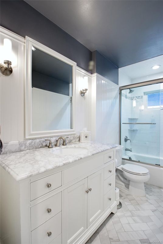Bathroom, Dual Sink Vanities, Glass Shower, Interior, Marble, Recessed Lighting