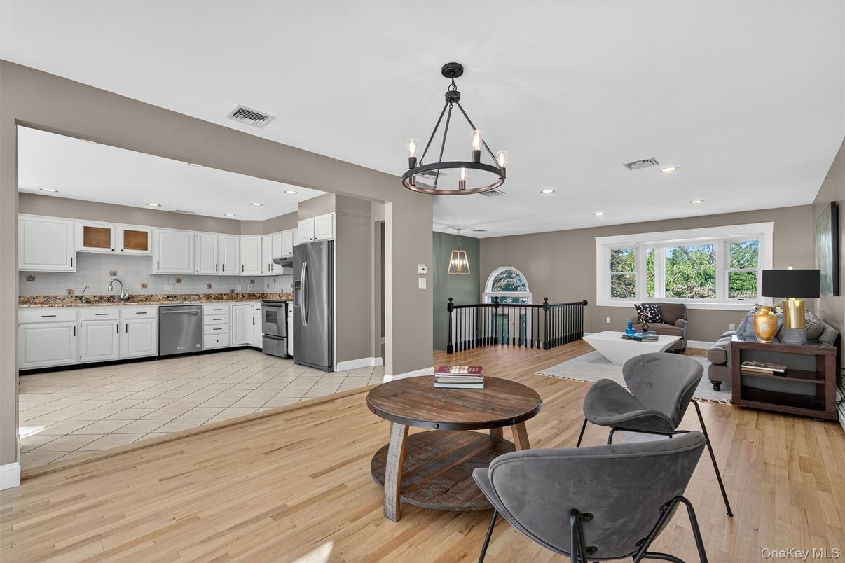 Dining room, Interior, Kitchen, Living room, Pendant Lights, Recessed Lighting, Stainless Steel Appliances, Wood Texture Flooring