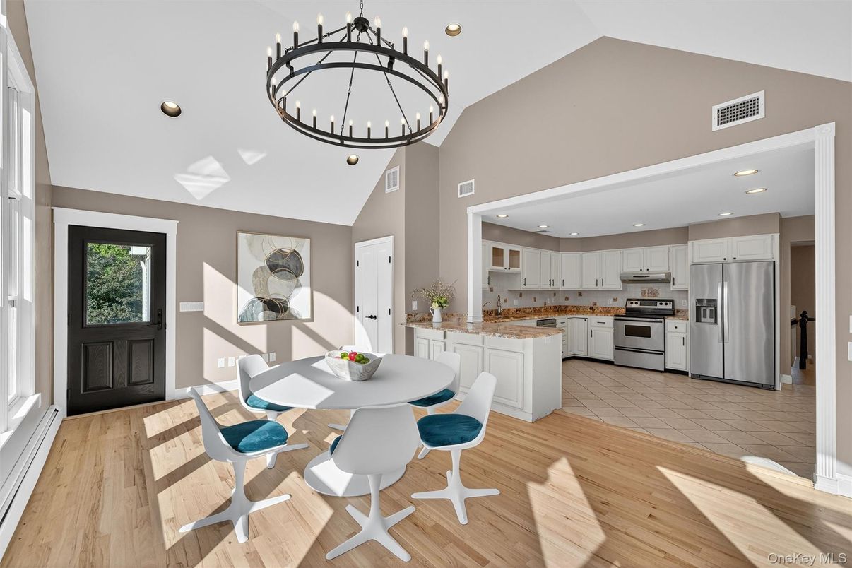 Dining room, Interior, Kitchen, Pendant Lights, Recessed Lighting, Stainless Steel Appliances, Wood Texture Flooring