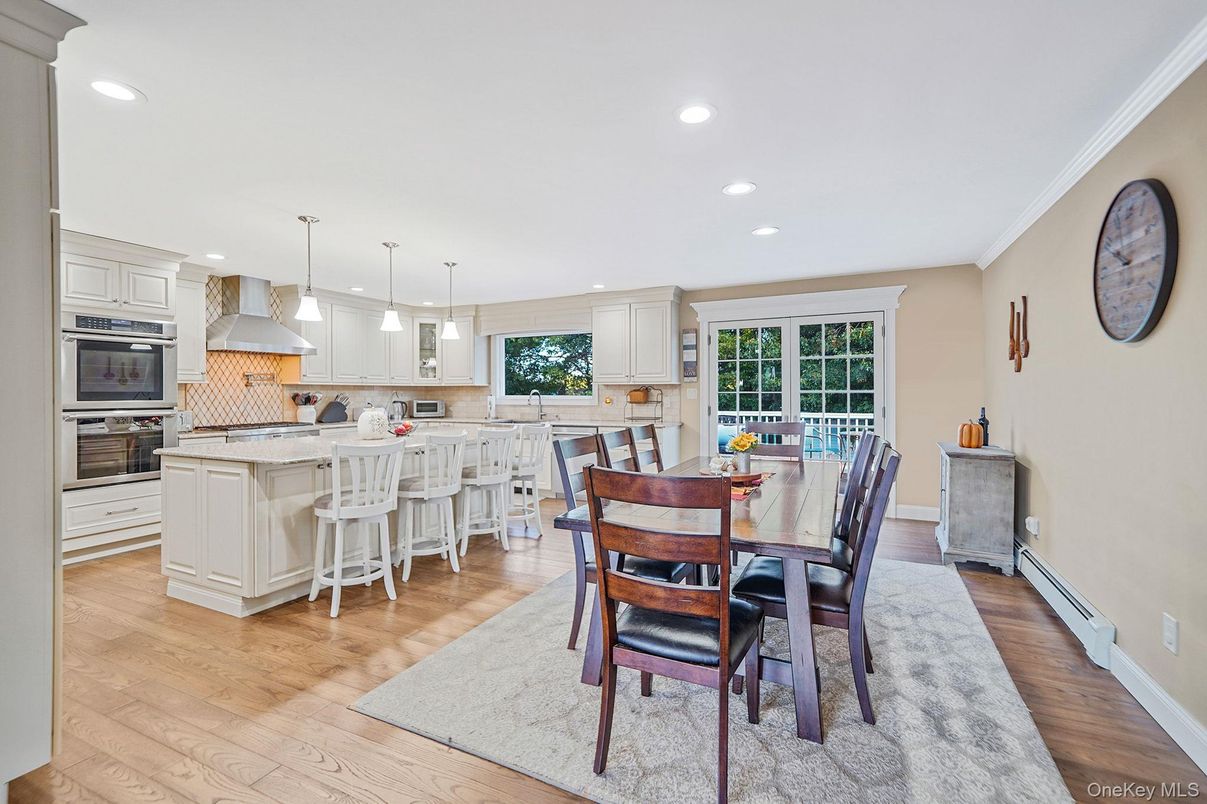 Dining room, Interior, Kitchen, Pendant Lights, Recessed Lighting, Stainless Steel Appliances, Wood Texture Flooring