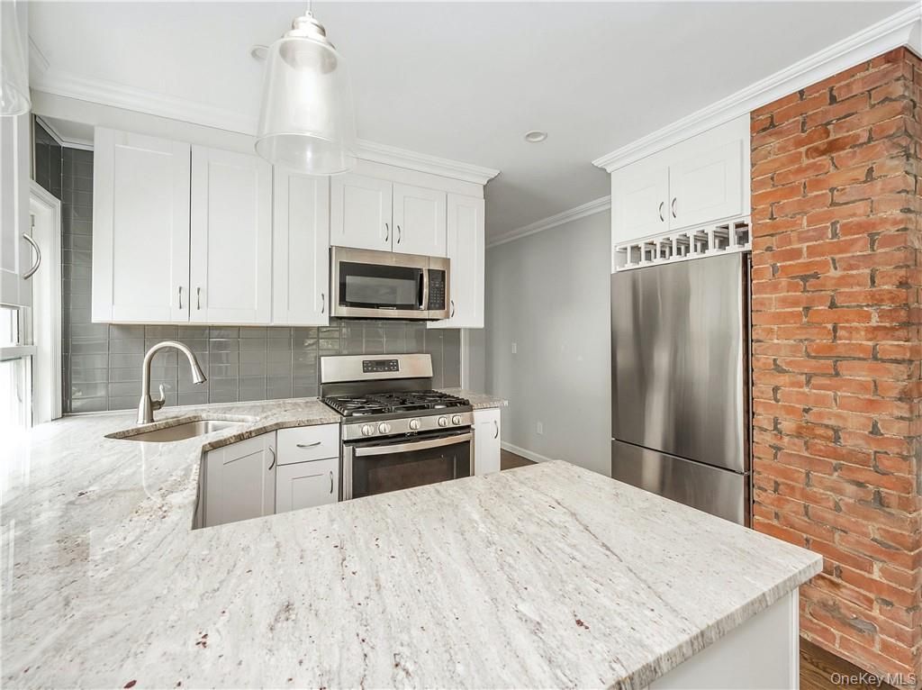 Interior, Kitchen, Recessed Lighting, Stainless Steel Appliances, Stone Walls
