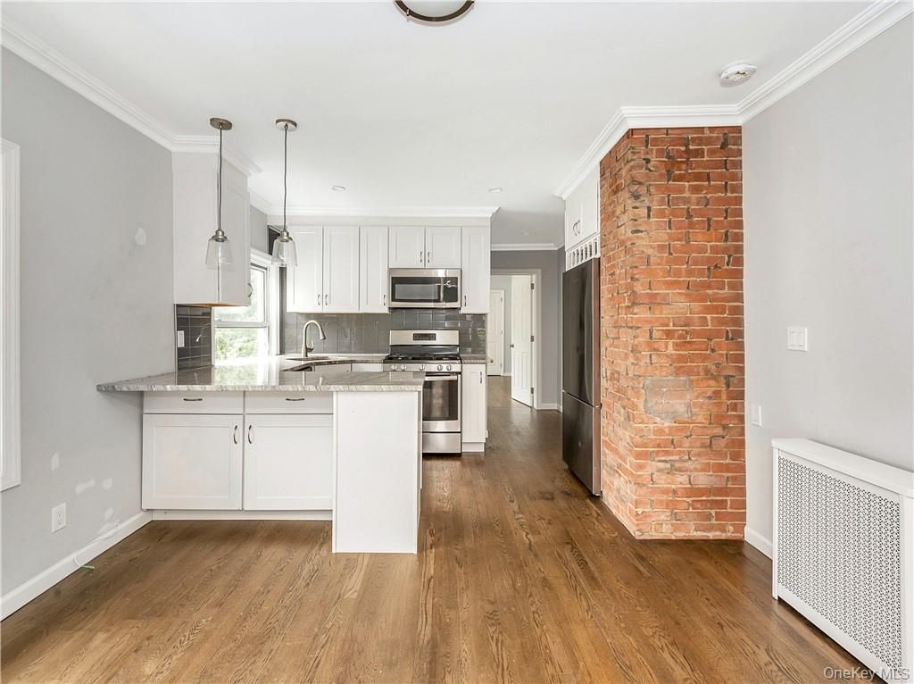 Interior, Kitchen, Pendant Lights, Recessed Lighting, Stainless Steel Appliances, Stone Walls, Wood Texture Flooring