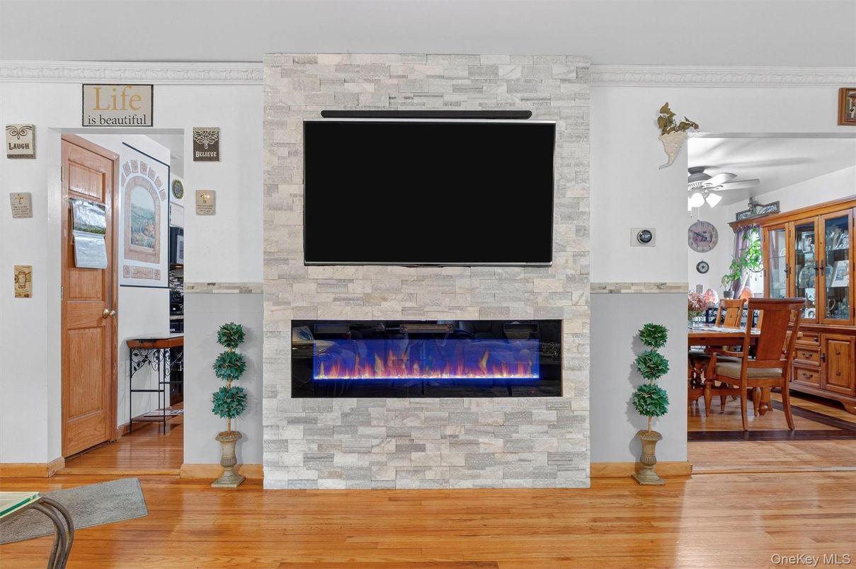 Dining room, Fireplace, Interior, Stone Walls, Wood Texture Flooring