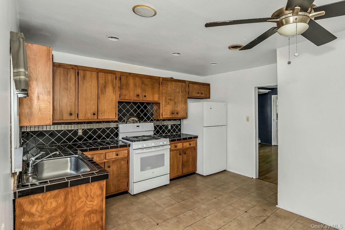 Interior, Kitchen, Recessed Lighting, Tile Countertops