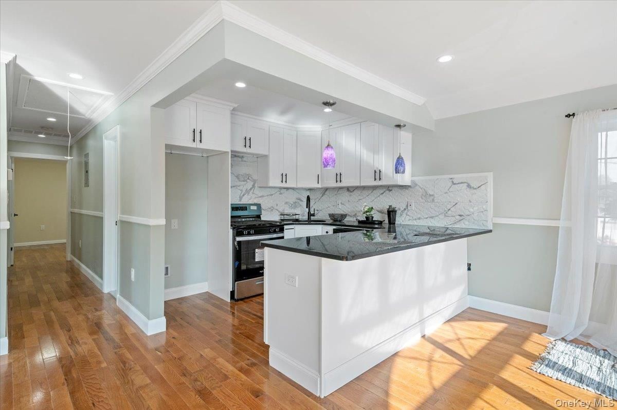 Interior, Kitchen, Marble Walls, Recessed Lighting, Wood Texture Flooring