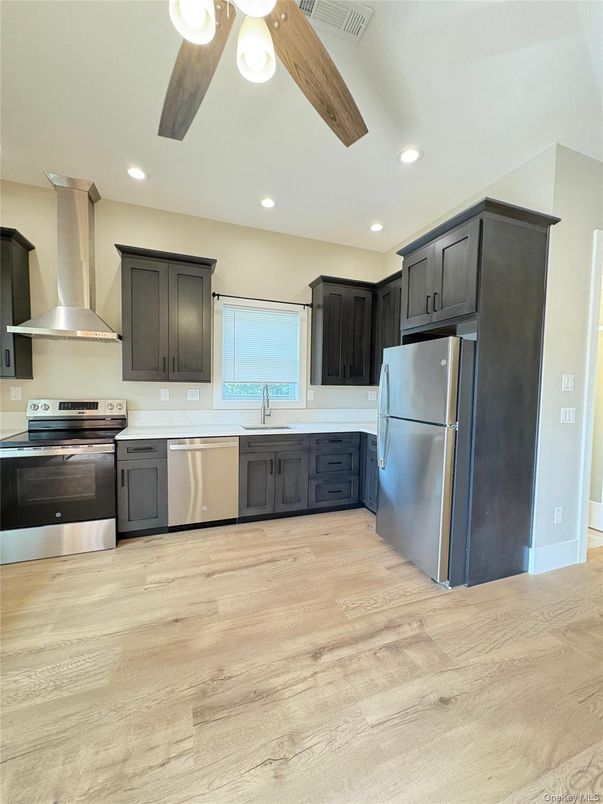 Interior, Kitchen, Recessed Lighting, Stainless Steel Appliances, Wood Texture Flooring