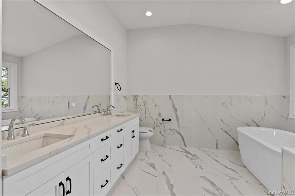 Bathroom, Dual Sink Vanities, Free Standing Baths, Interior, Marble, Marble Walls, Recessed Lighting