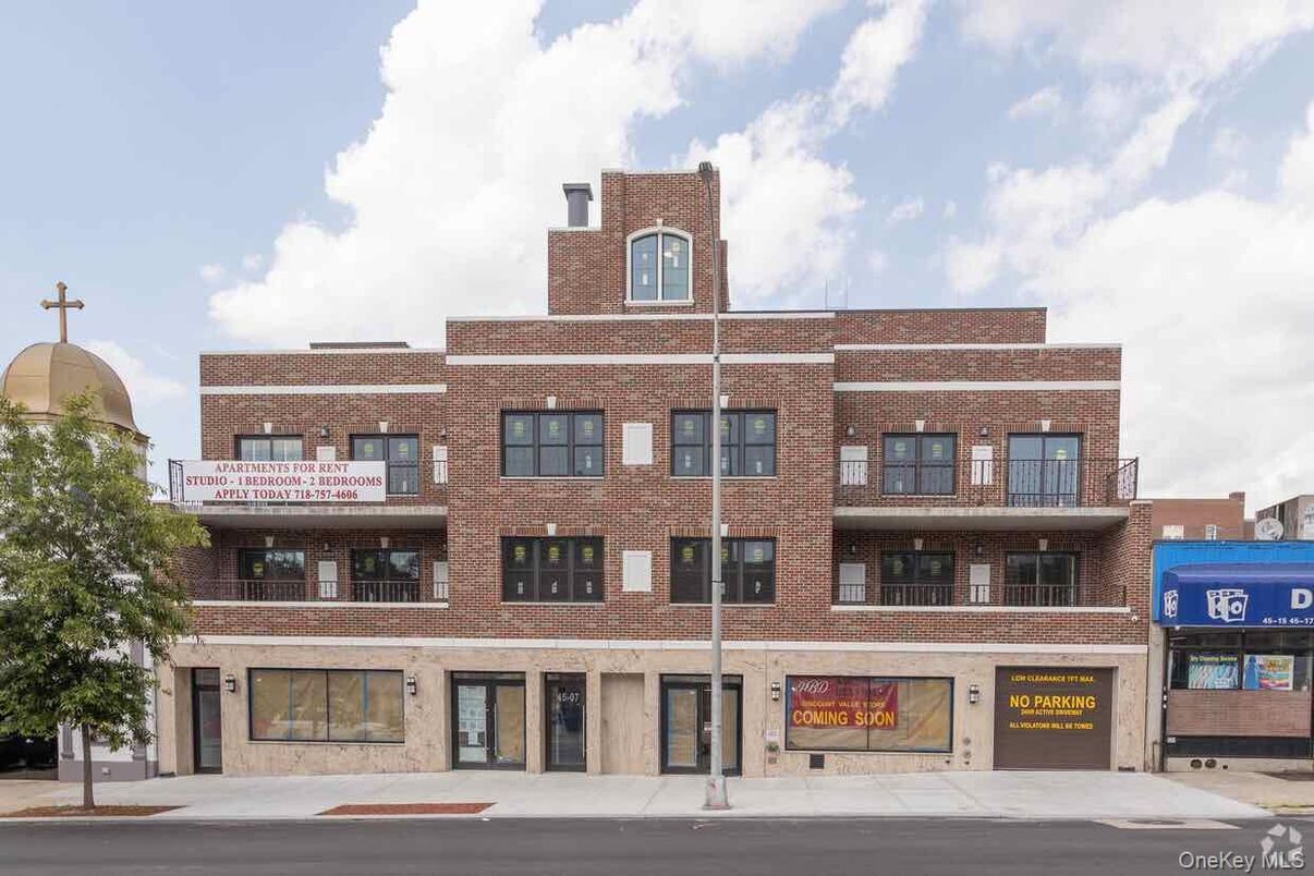 Exterior, Facade, Brick Facade, Condo Building