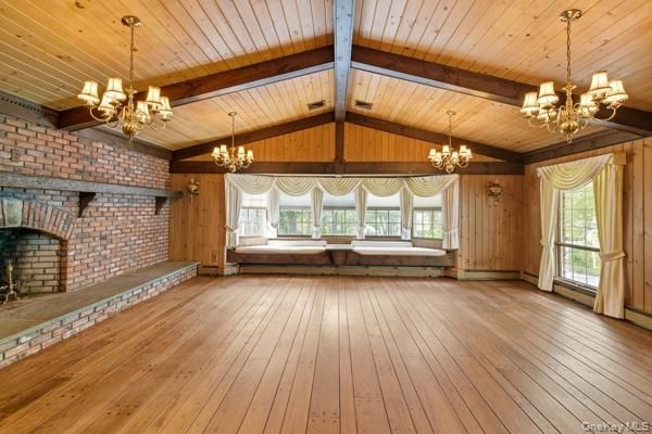 Chandelier, Empty room, Fireplace, Interior, Stone Walls, Wooden Beams, Wooden Ceilings, Wood Texture Flooring