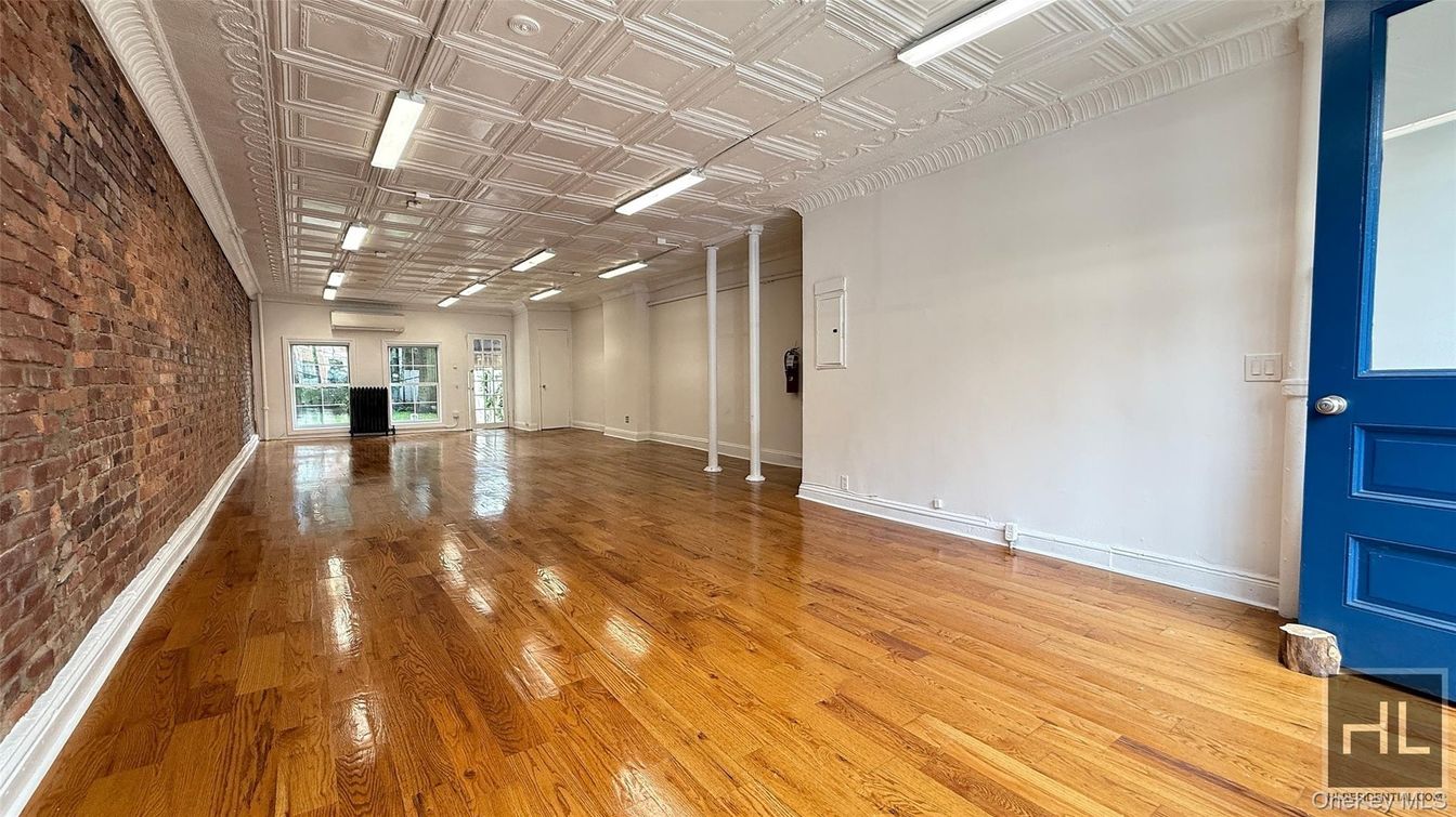 Empty room, Interior, Recessed Lighting, Stone Walls, Wood Texture Flooring