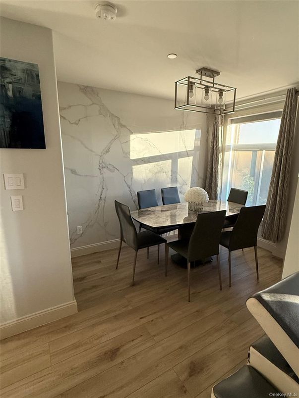 Dining room, Interior, Marble Walls, Recessed Lighting, Wood Texture Flooring