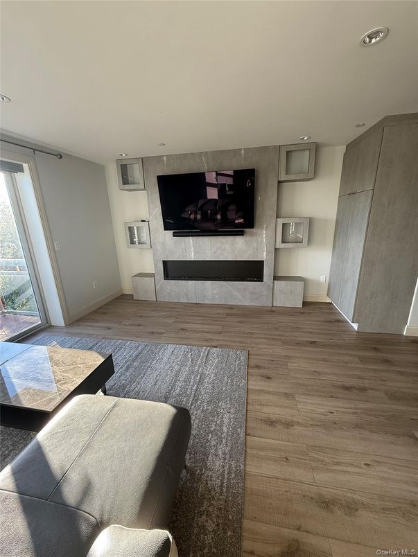 Fireplace, Interior, Living room, Recessed Lighting, Wood Texture Flooring