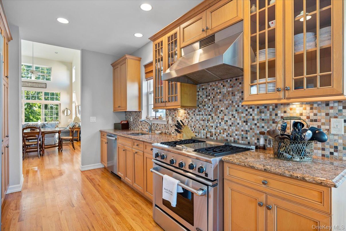 Dining room, Interior, Kitchen, Recessed Lighting, Stainless Steel Appliances, Wood Texture Flooring