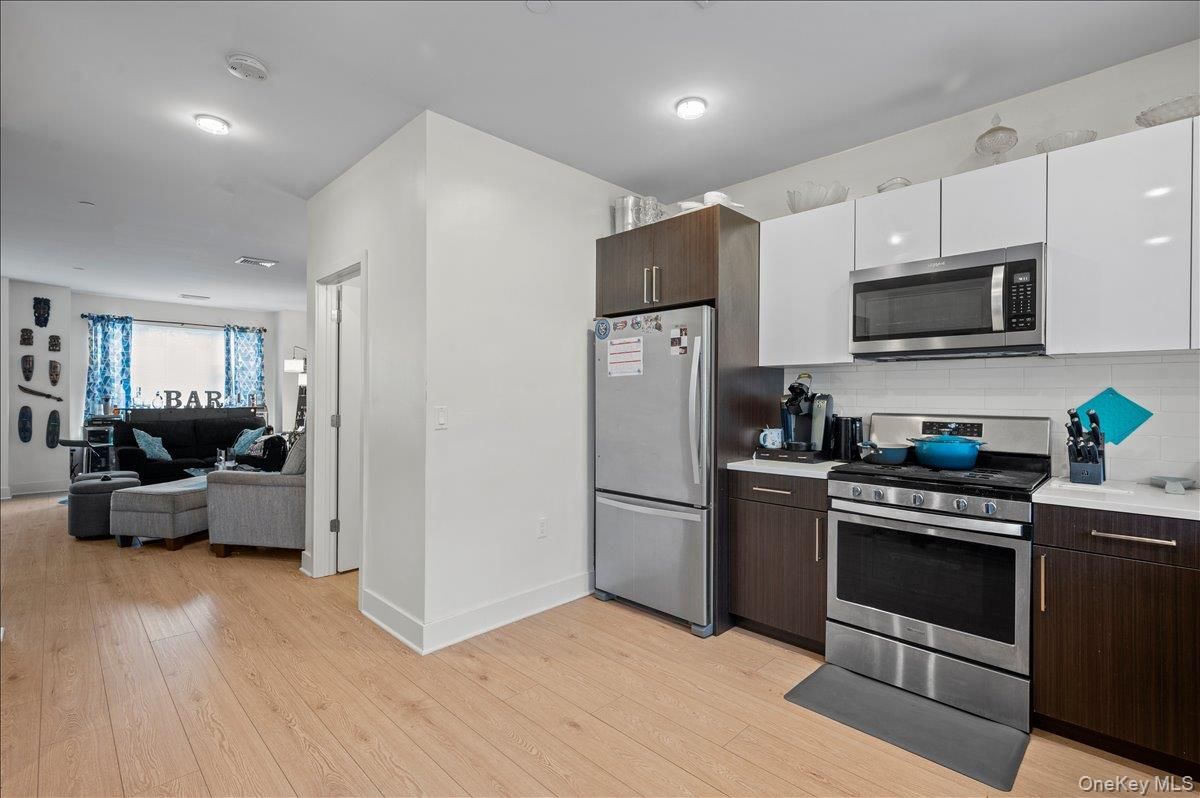 Interior, Kitchen, Living room, Recessed Lighting, Stainless Steel Appliances, Wood Texture Flooring