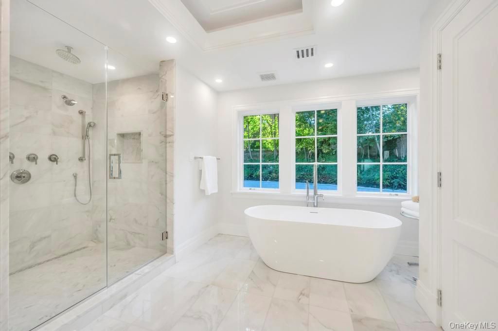 Bathroom, Free Standing Baths, Glass Shower, Interior, Marble, Marble Walls, Recessed Lighting