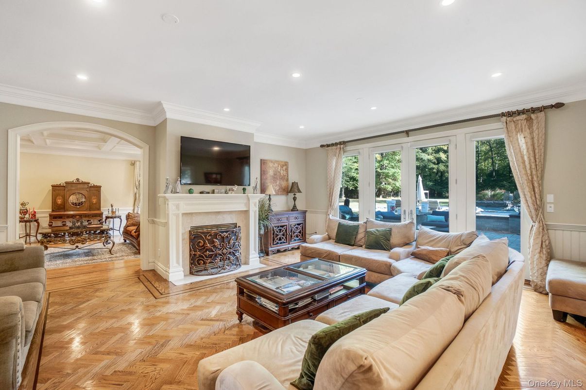 Dining room, Fireplace, Interior, Living room, Recessed Lighting, Wood Texture Flooring