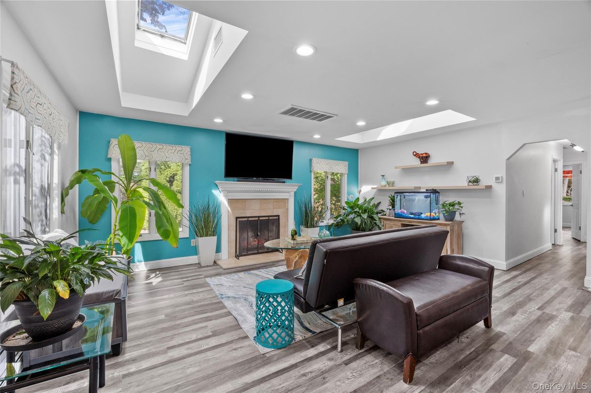 Fireplace, Interior, Living room, Recessed Lighting, Wood Texture Flooring