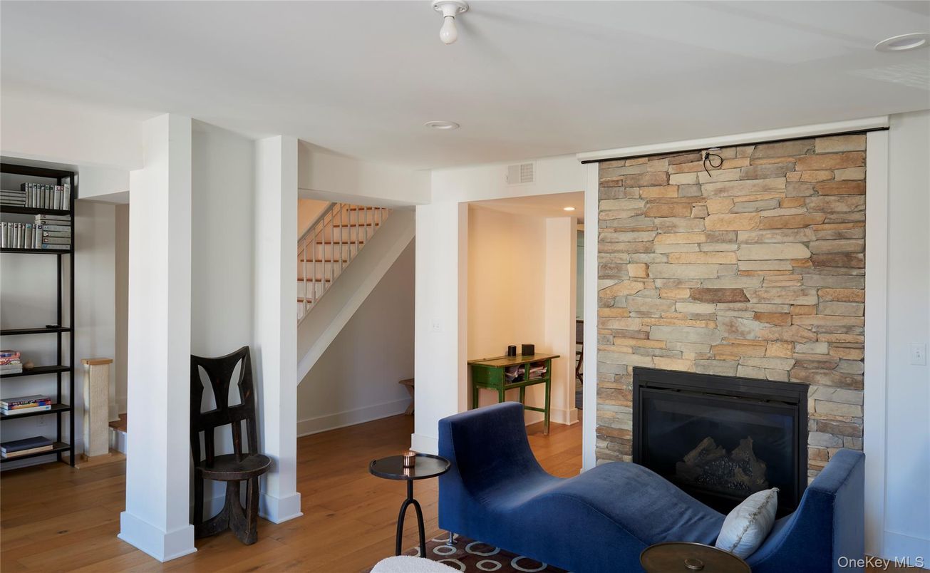 Fireplace, Interior, Recessed Lighting, Stone Walls, Wood Texture Flooring
