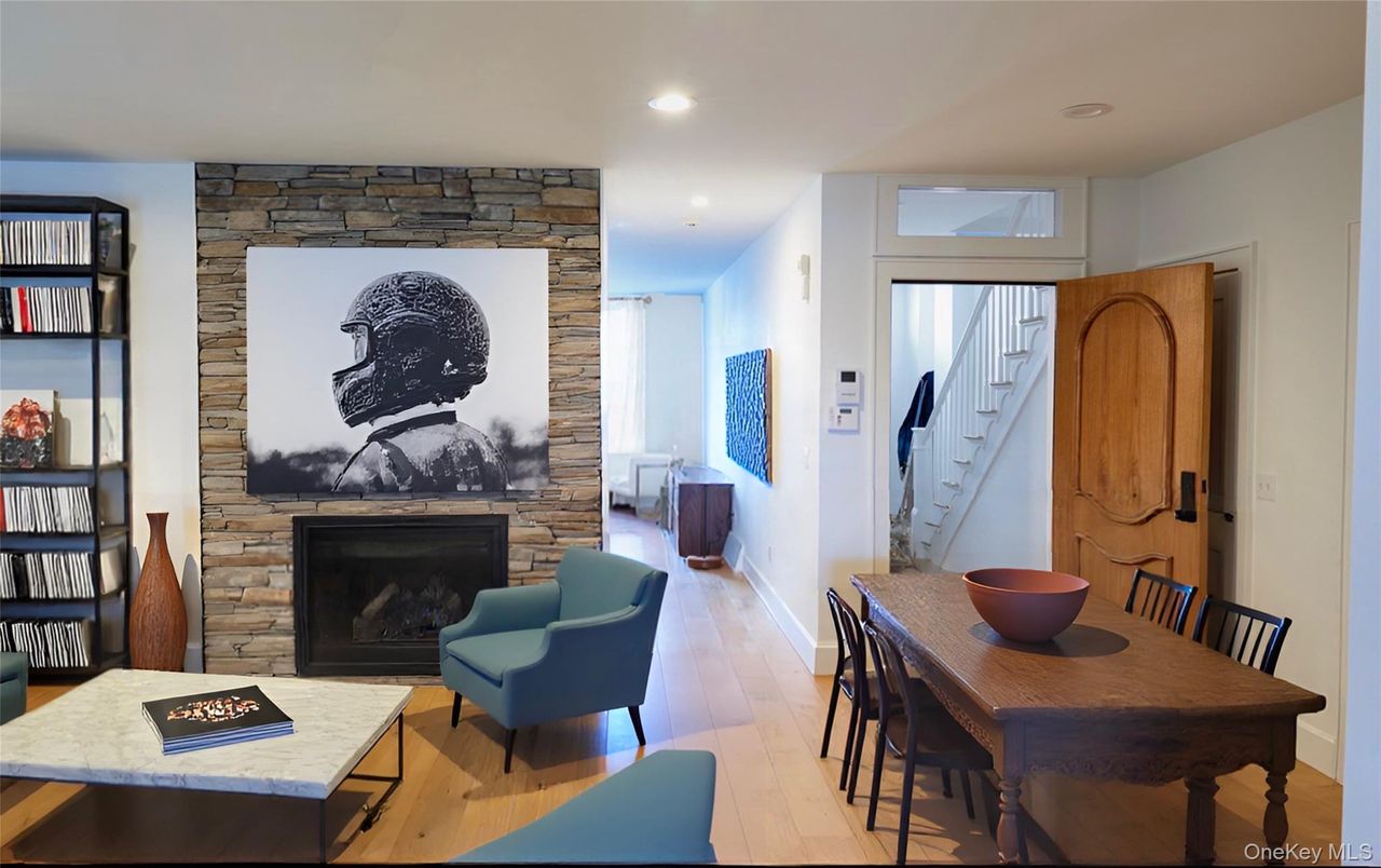 Dining room, Fireplace, Interior, Recessed Lighting, Stone Walls, Wood Texture Flooring
