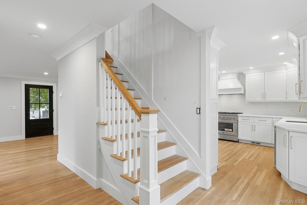 Interior, Kitchen, Recessed Lighting, Stainless Steel Appliances, Washer, Wood Texture Flooring