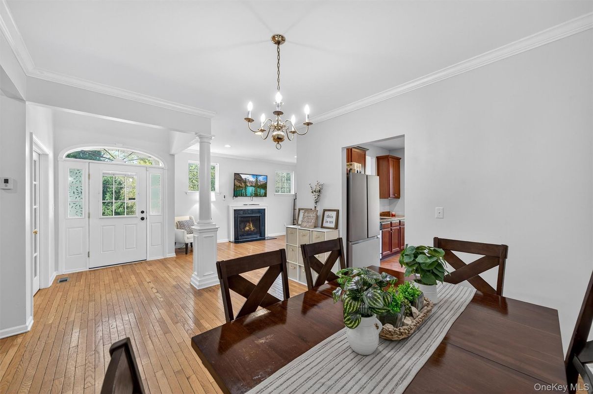 Chandelier, Dining room, Fireplace, Interior, Wood Texture Flooring