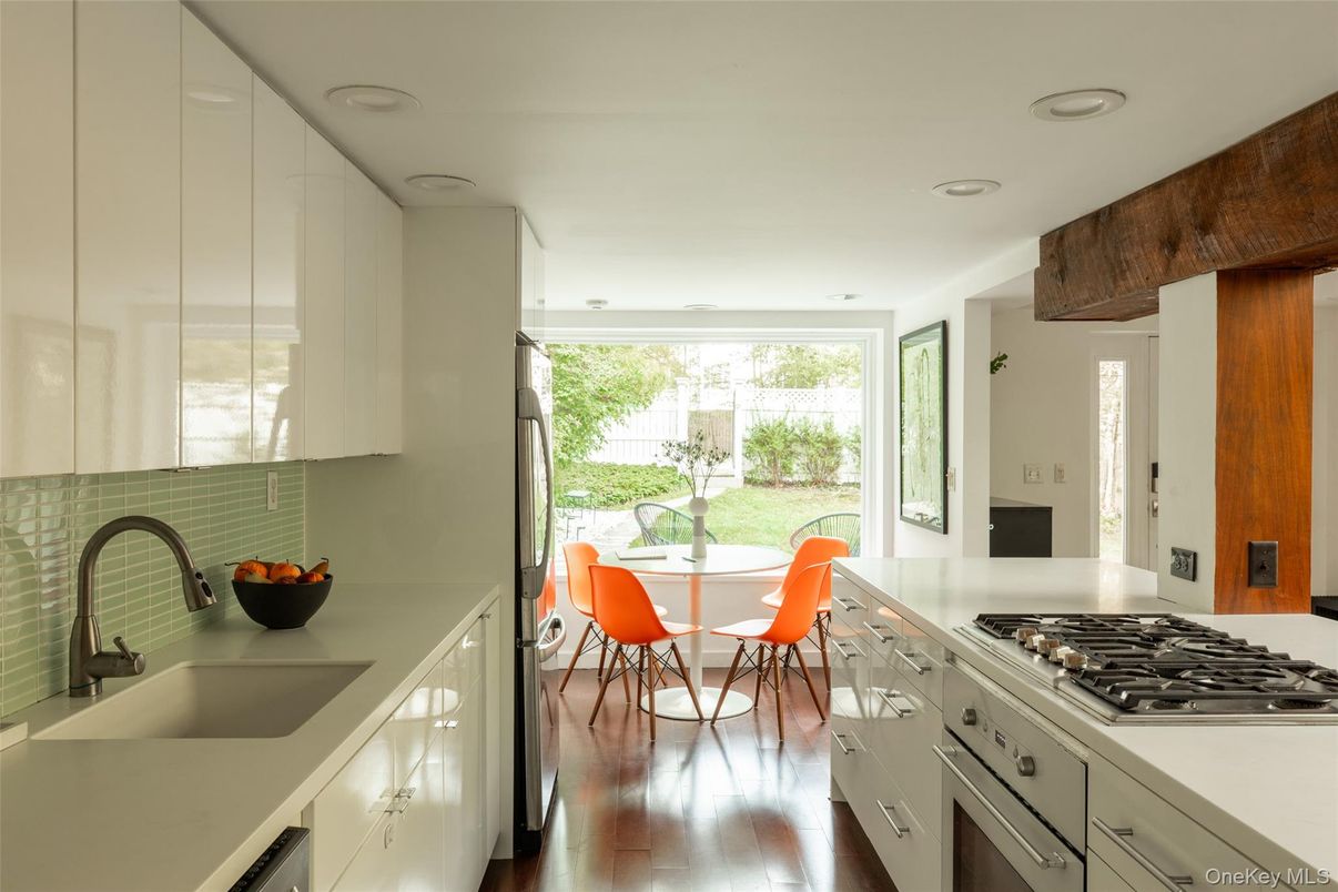 Dining room, Interior, Kitchen, Recessed Lighting, Stainless Steel Appliances, Wood Texture Flooring