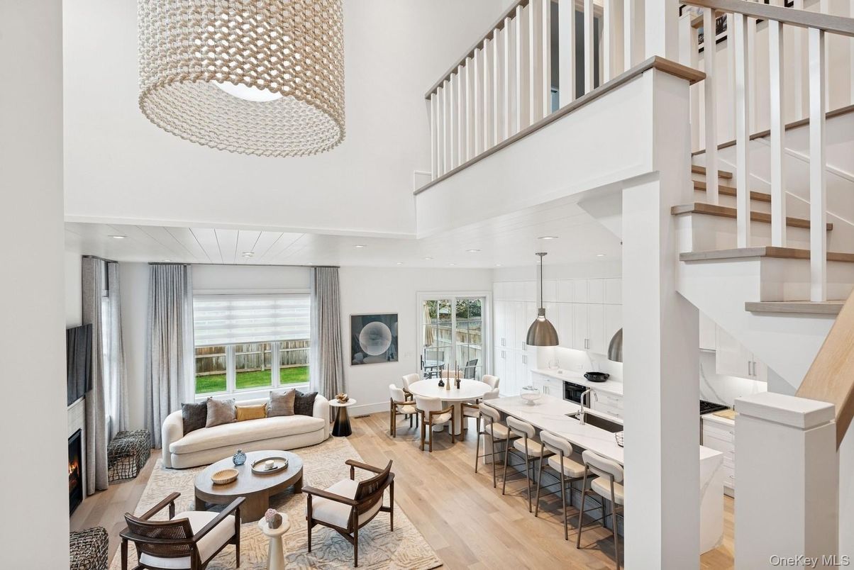 Dining room, Fireplace, Interior, Living room, Pendant Lights, Recessed Lighting, Wood Texture Flooring