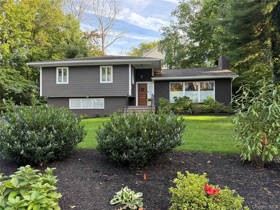 Exterior, Facade, Brick Facade, Raised Ranch