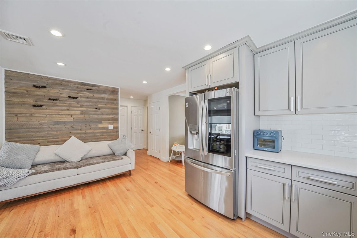 Interior, Kitchen, Recessed Lighting, Stainless Steel Appliances, Wood Texture Flooring, Wooden Walls