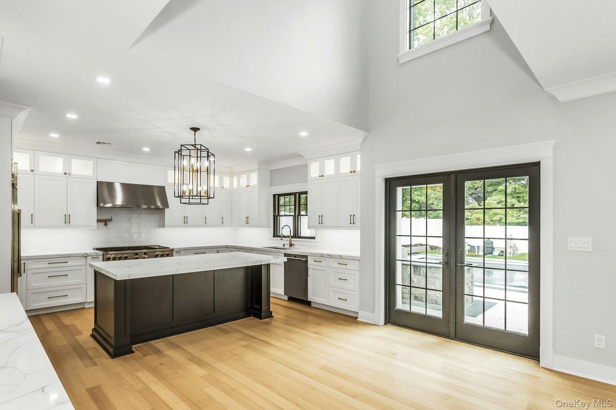 Chandelier, Interior, Kitchen, Pendant Lights, Recessed Lighting, Stainless Steel Appliances, Wood Texture Flooring