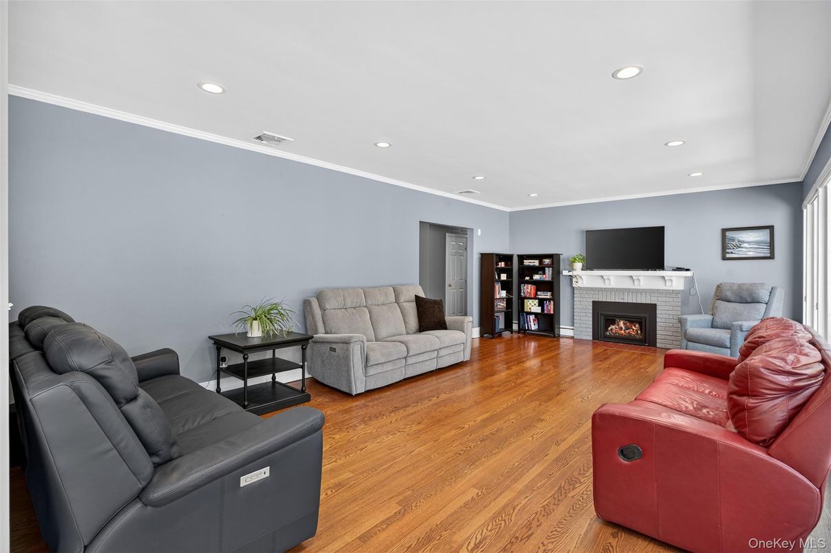 Fireplace, Interior, Living room, Recessed Lighting, Wood Texture Flooring
