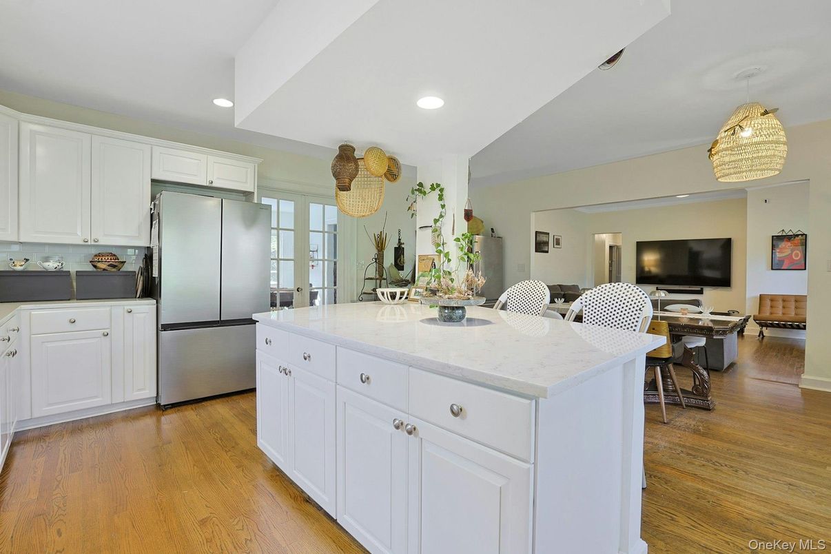 Dining room, Interior, Kitchen, Recessed Lighting, Stainless Steel Appliances, Wood Texture Flooring
