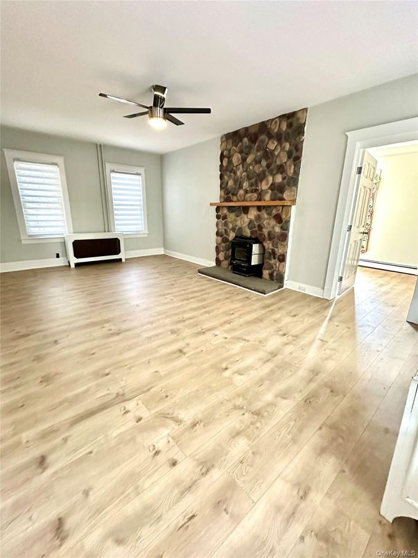 Empty room, Fireplace, Interior, Stone Walls, Wood Texture Flooring