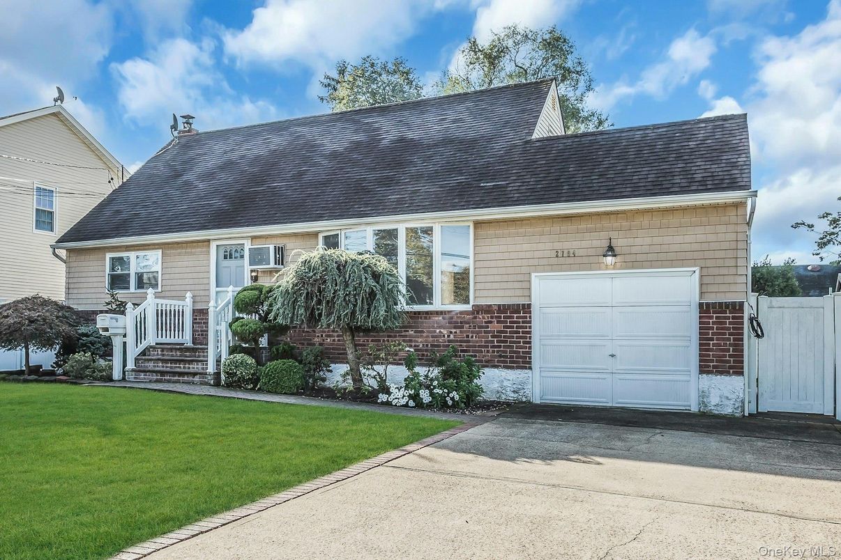 Attached, Exterior, Facade, Brick Facade, Cape Cod