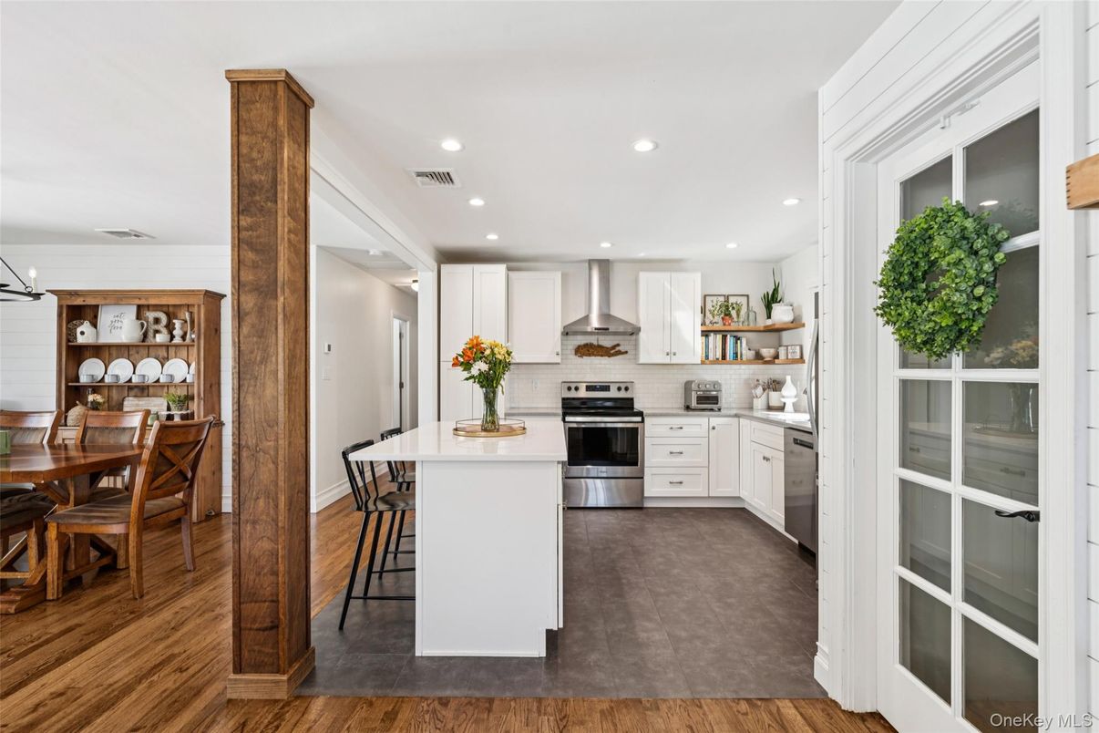 Dining room, Interior, Kitchen, Recessed Lighting, Stainless Steel Appliances, Wood Texture Flooring