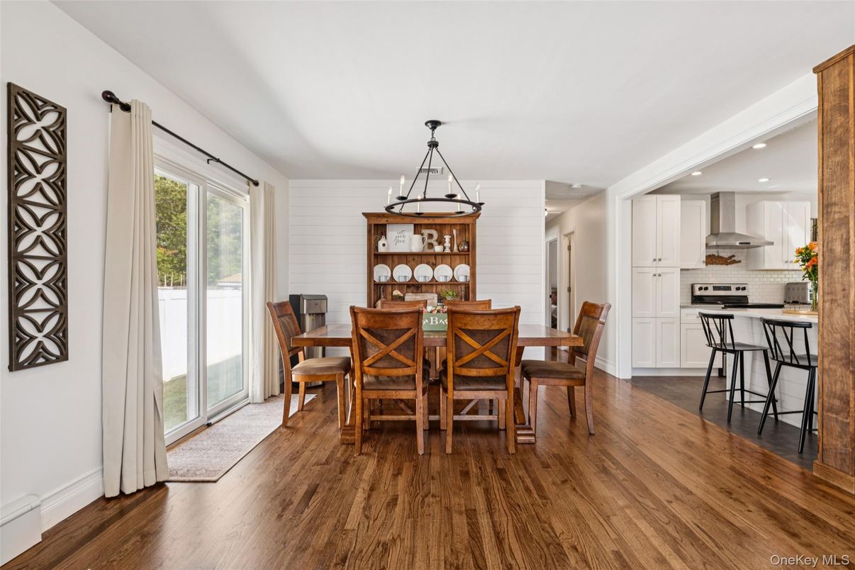 Dining room, Interior, Kitchen, Pendant Lights, Recessed Lighting, Stainless Steel Appliances, Wood Texture Flooring
