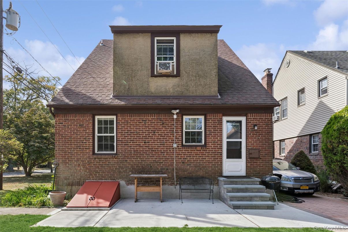 Exterior, Facade, Brick Facade, Cape Cod