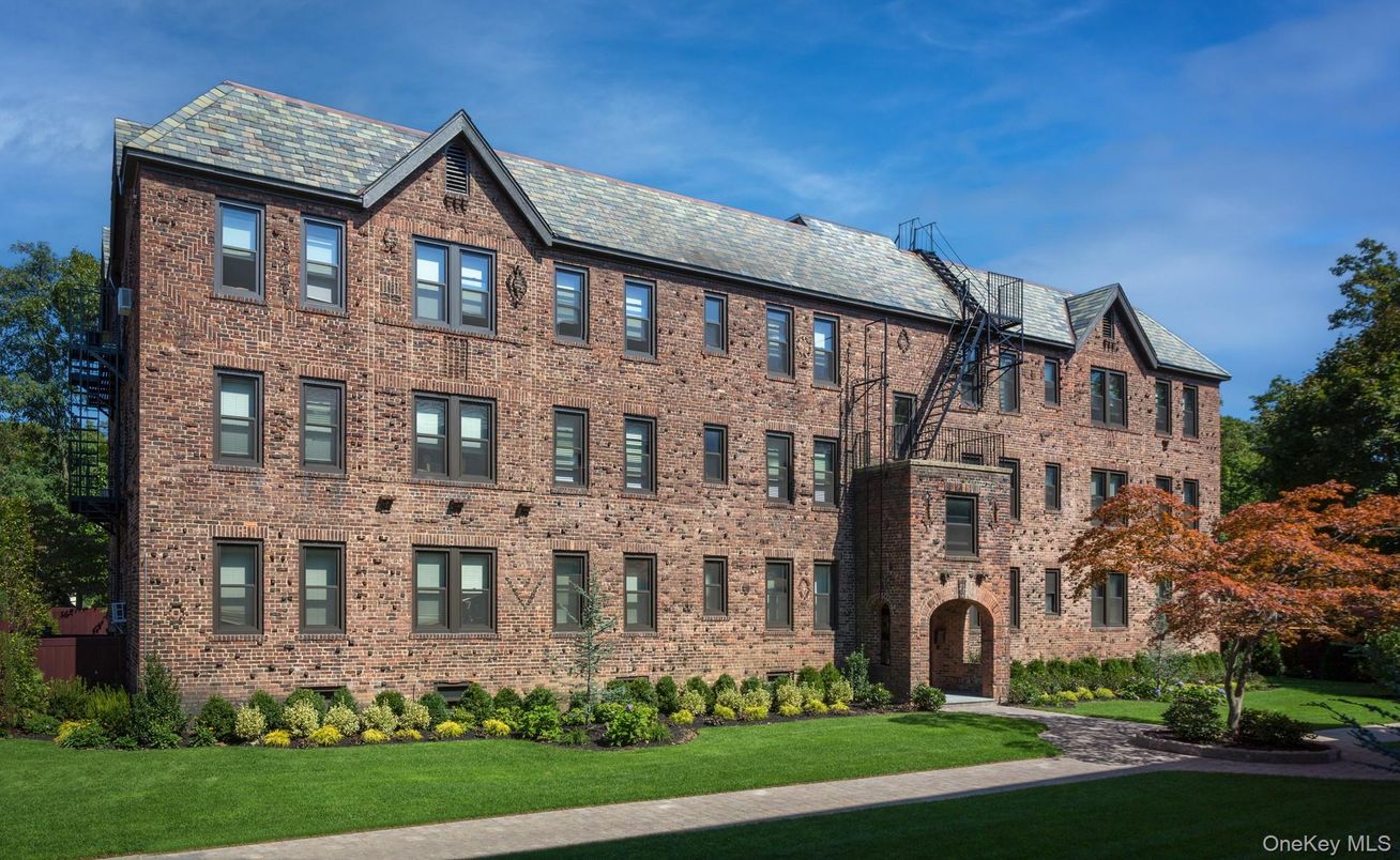 Exterior, Facade, Brick Facade, Condo Building