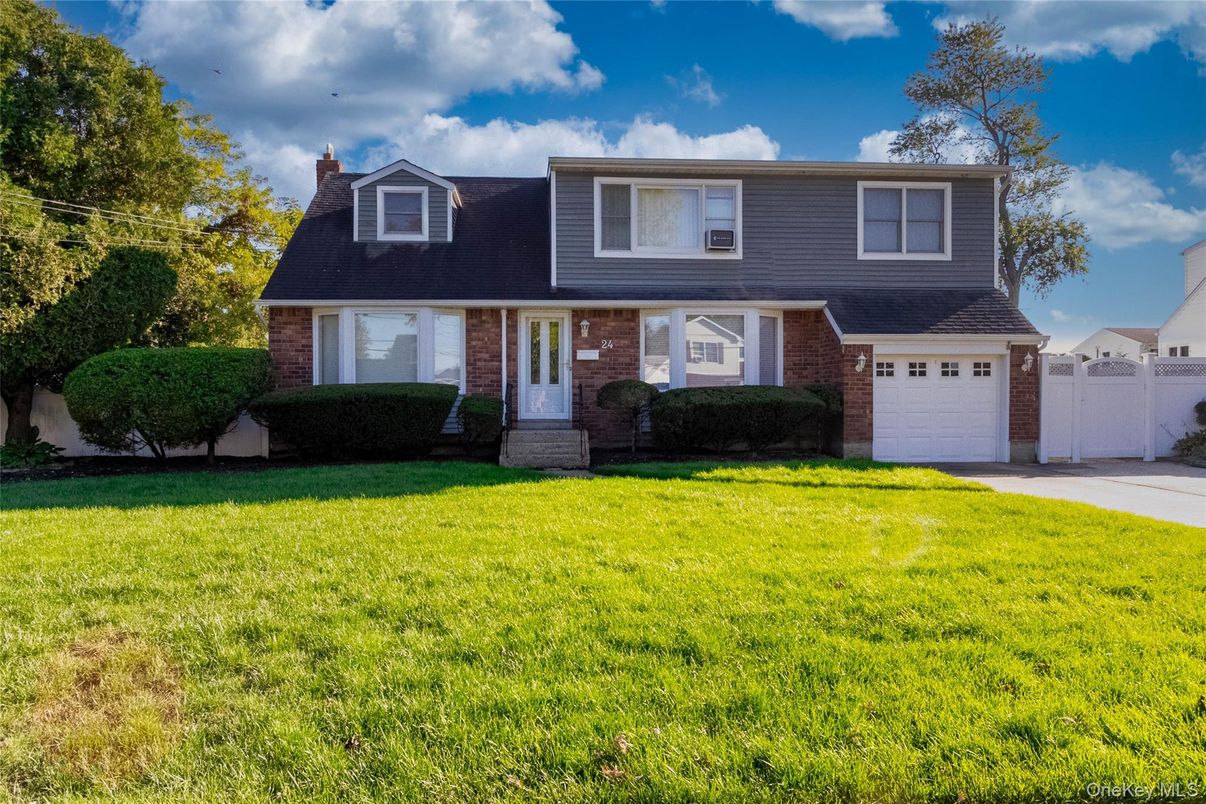 Attached, Exterior, Facade, Brick Facade, Cape Cod