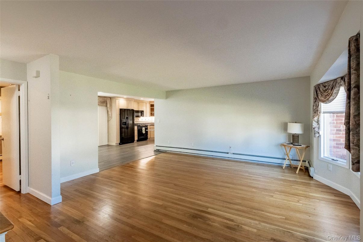 Empty room, Interior, Kitchen, Stainless Steel Appliances, Wood Texture Flooring
