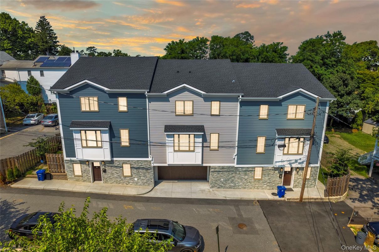 Attached, Exterior, Facade, Solar Panels, Rowhouse