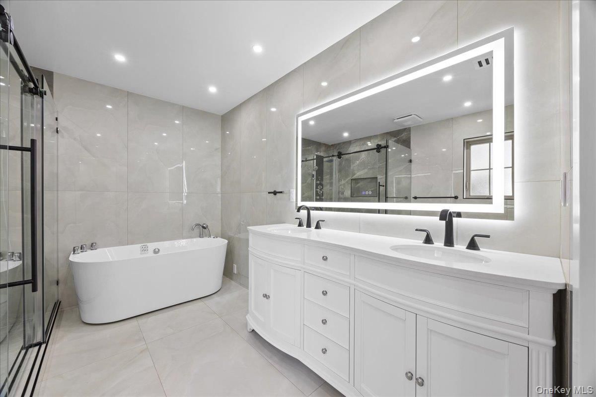 Bathroom, Dual Sink Vanities, Free Standing Baths, Glass Shower, Interior, Recessed Lighting