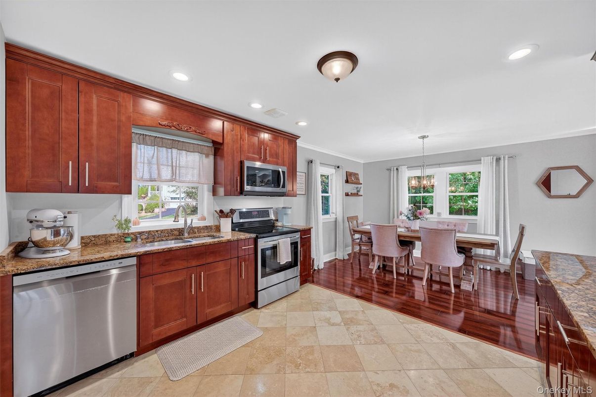 Dining room, Interior, Kitchen, Pendant Lights, Recessed Lighting, Stainless Steel Appliances, Wood Texture Flooring