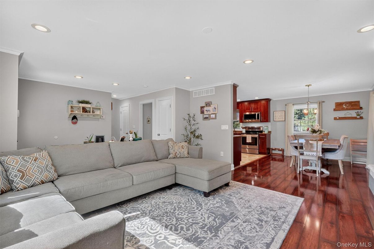 Dining room, Interior, Kitchen, Living room, Pendant Lights, Recessed Lighting, Stainless Steel Appliances, Wood Texture Flooring