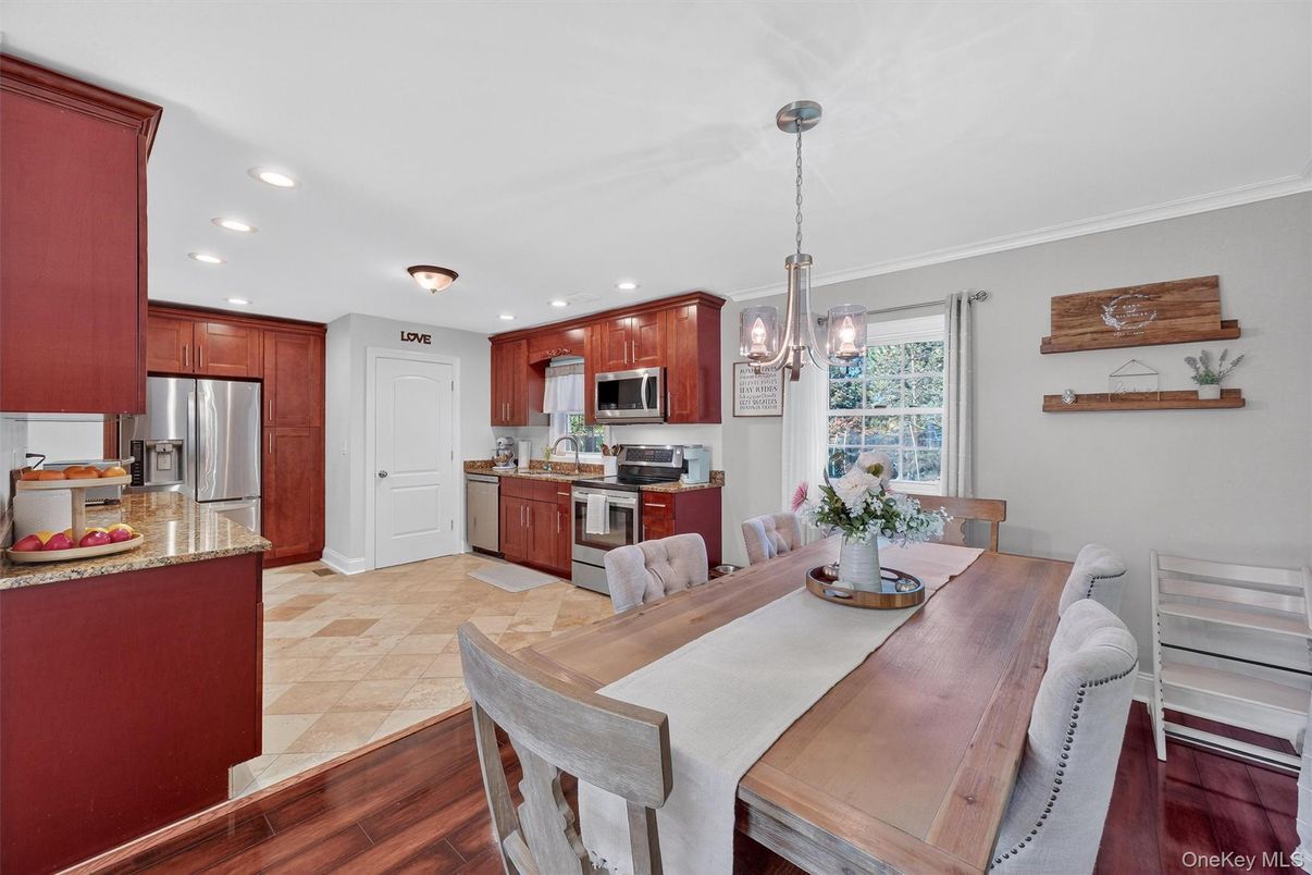 Dining room, Interior, Kitchen, Pendant Lights, Recessed Lighting, Stainless Steel Appliances, Wood Texture Flooring