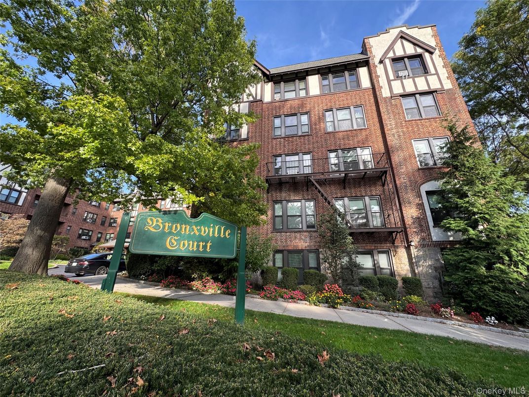 Exterior, Facade, Brick Facade, Condo Building