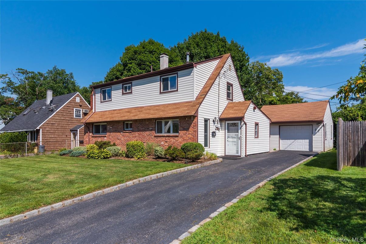 Attached, Detached Garage, Exterior, Facade, Brick Facade, Cape Cod