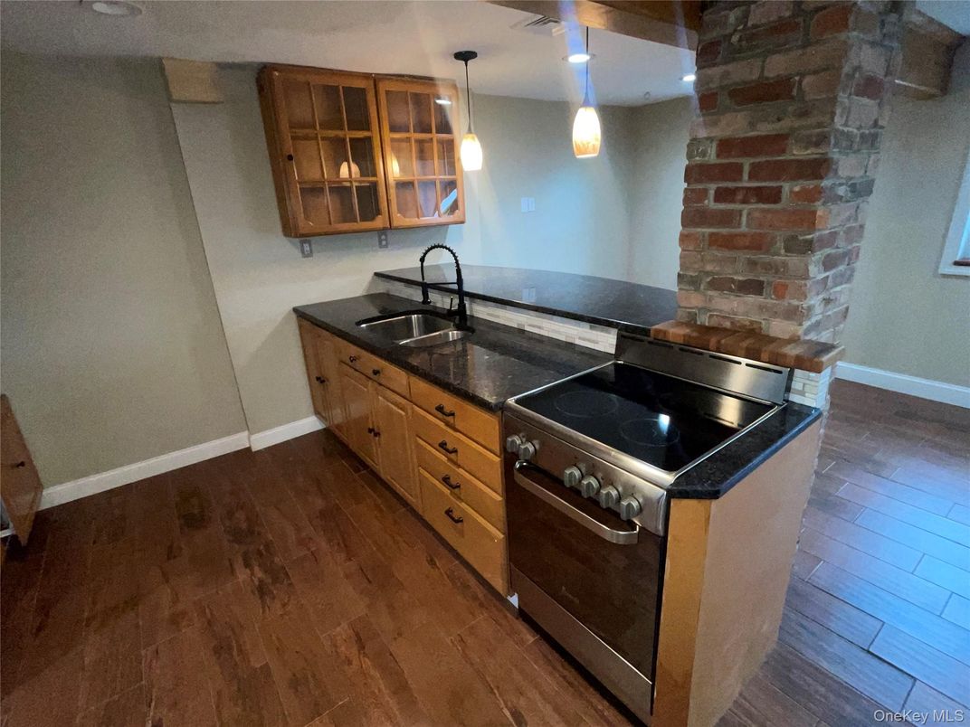 Interior, Kitchen, Pendant Lights, Stainless Steel Appliances, Stone Walls, Wood Texture Flooring