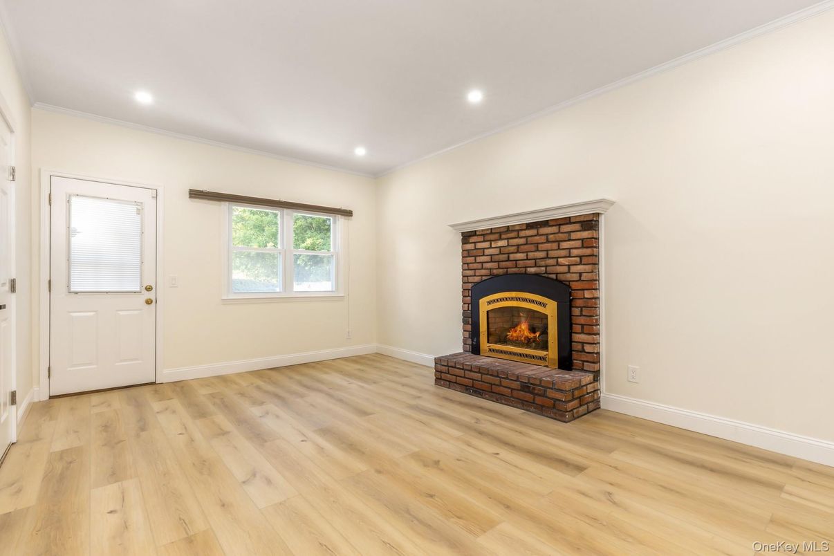 Empty room, Fireplace, Interior, Recessed Lighting, Wood Texture Flooring